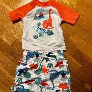 Dinosaur infant bathing suit. 6-9 months